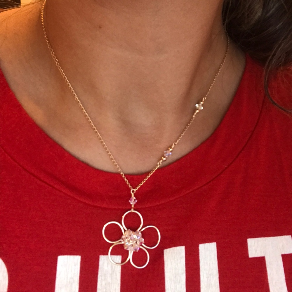 handmade necklace, with details of flowers